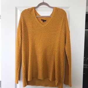 mustard colored sweater